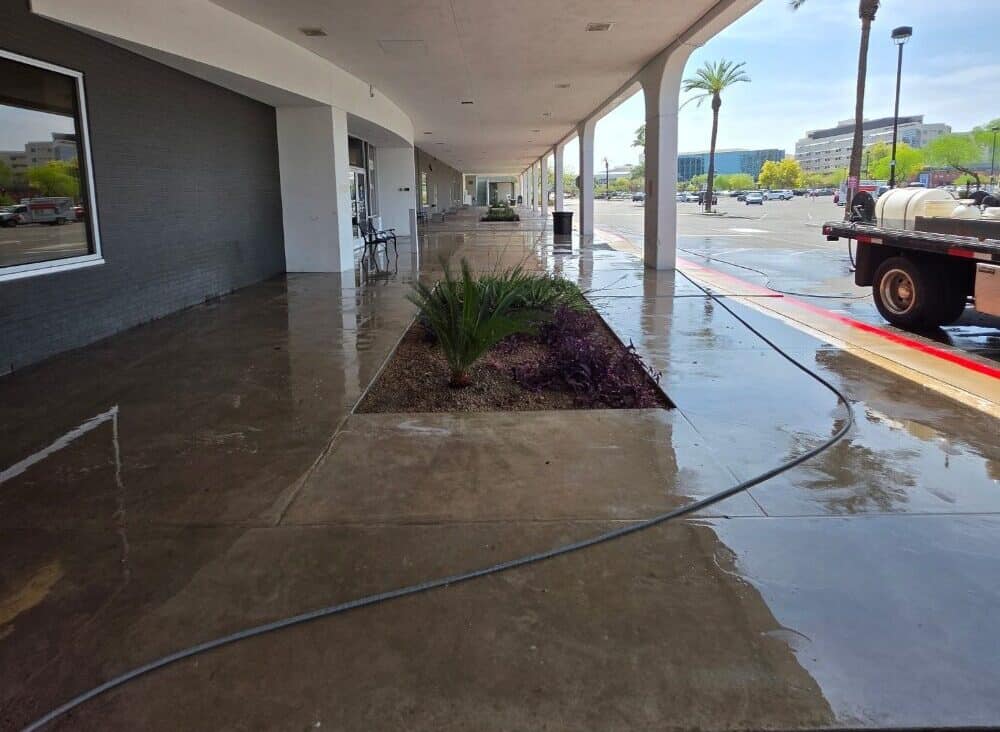 Clean Surface technician performing exterior cleaning